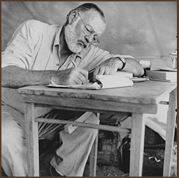 Hemingway at writing desk