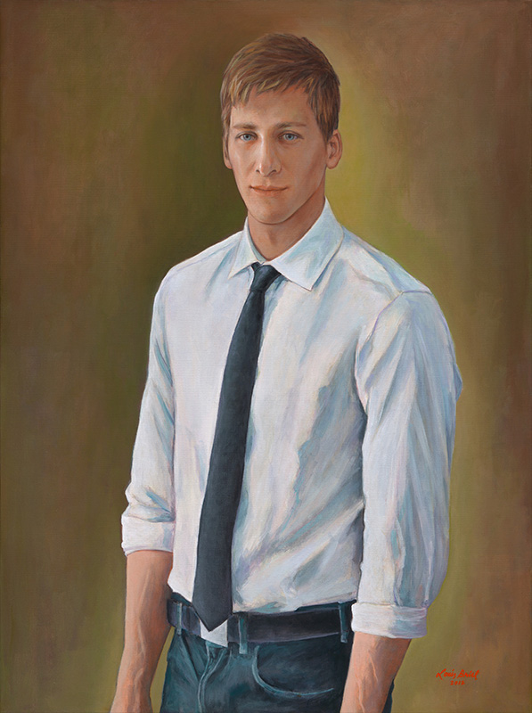 Waist length portrait of a young White man in a white shirt with a tie