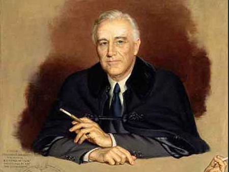 Man in a dark suit against a brown background
