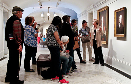 Volunteer docent giving a tour 