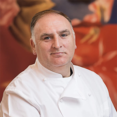 bust length portrait of a man in a chef's white tunic