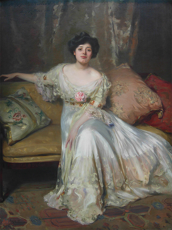full length portrait of a woman in a long white dress
