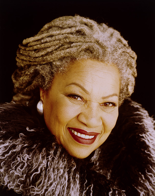 woman with gray cornrows in a fur coat