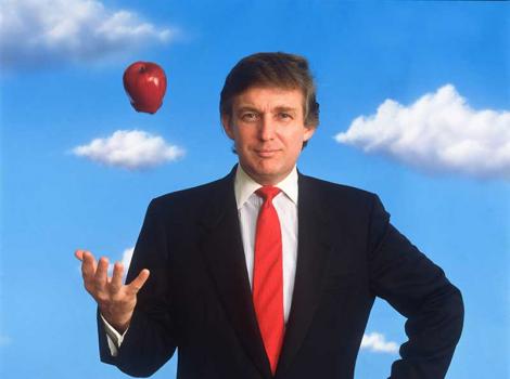 Photograph of a man throwing an apple against a blue sky background 