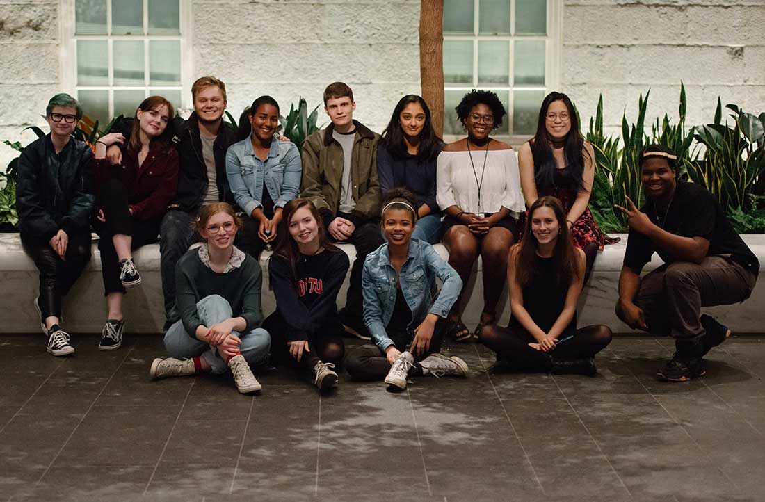 Group photo of the Teen Museum council - a young diverse group of 13 students