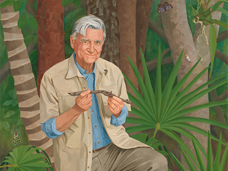 white haired man in the jungle